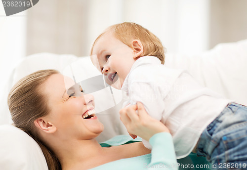 Image of happy mother with adorable baby