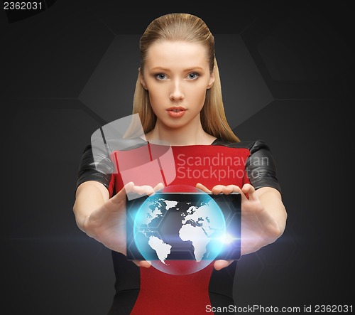 Image of woman holding tablet pc with sign of globe