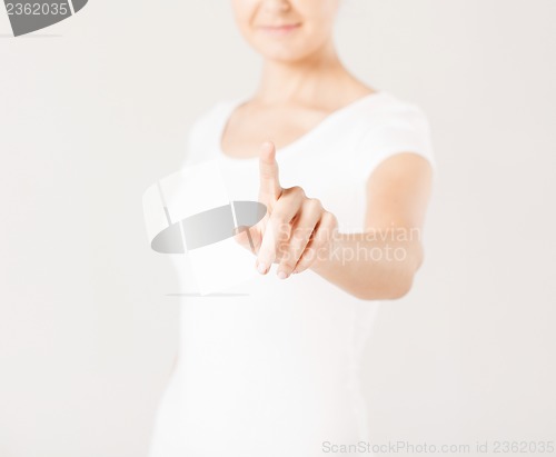 Image of woman with finger up