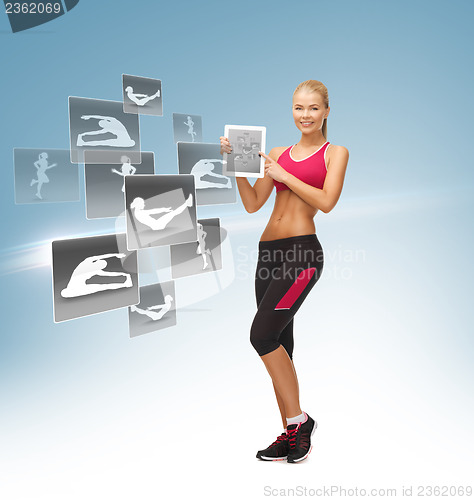 Image of woman with tablet pc and virtual application