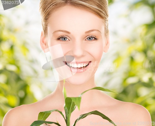 Image of woman with sprout