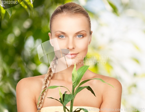 Image of woman with sprout