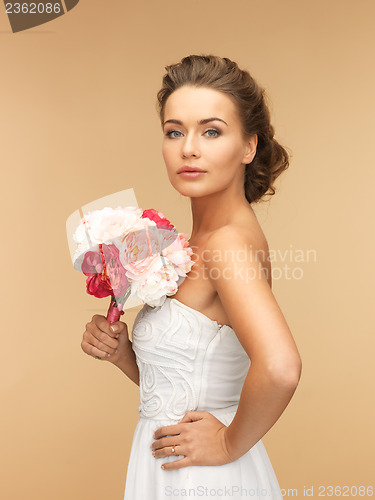 Image of woman with bouquet of flowers