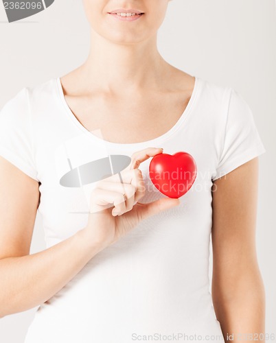 Image of woman hands with heart