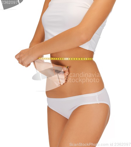 Image of woman with measuring tape