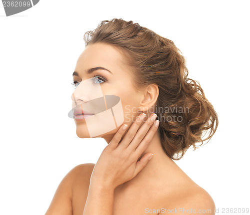 Image of face and hands of beautiful woman