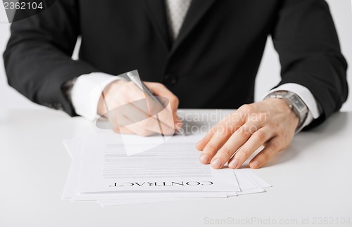 Image of man with contract