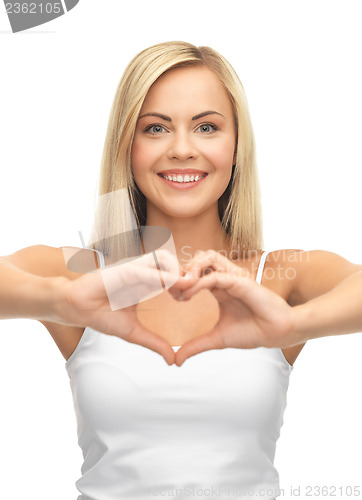 Image of woman showing heart shape