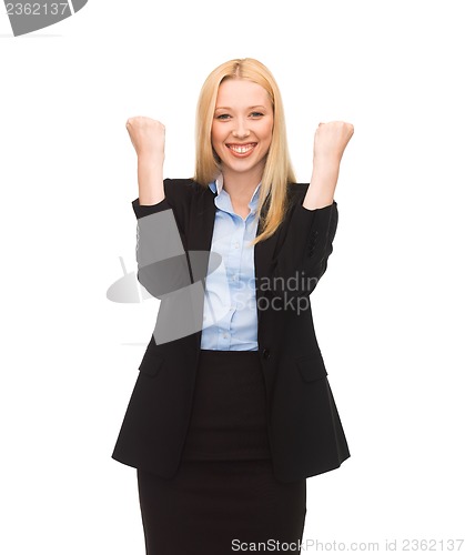 Image of happy woman with hands up