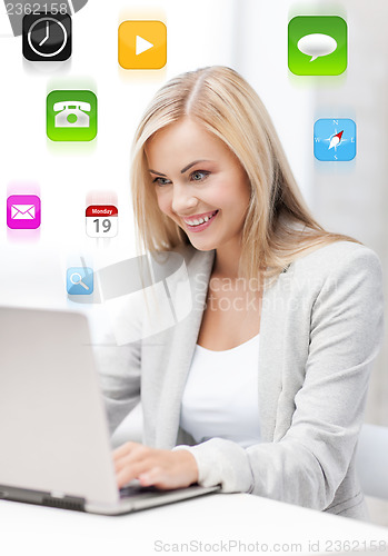 Image of businesswoman with laptop