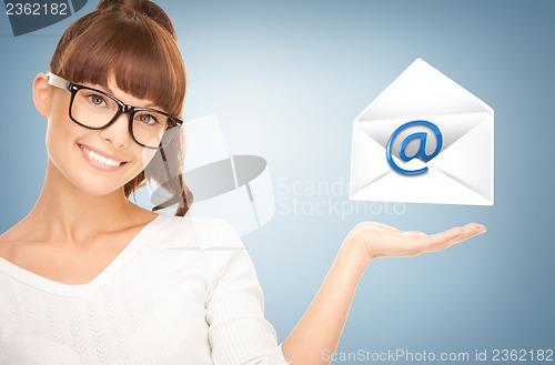 Image of woman showing virtual envelope