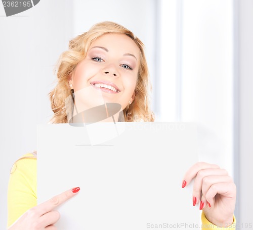 Image of happy woman with blank board