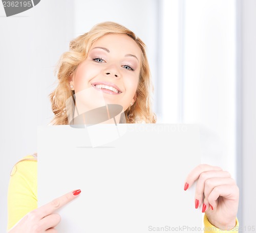 Image of happy woman with blank board