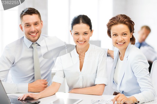 Image of business team working in office