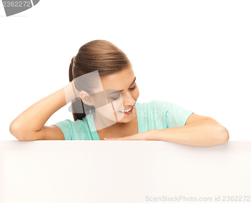 Image of woman with white blank board