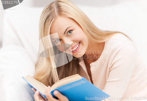 Image of woman reading book