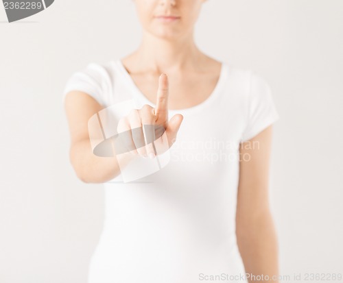 Image of woman with finger up