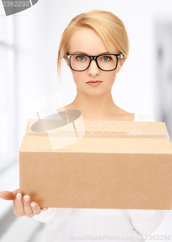 Image of woman with cardboard box