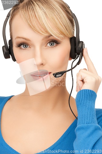 Image of friendly female helpline operator