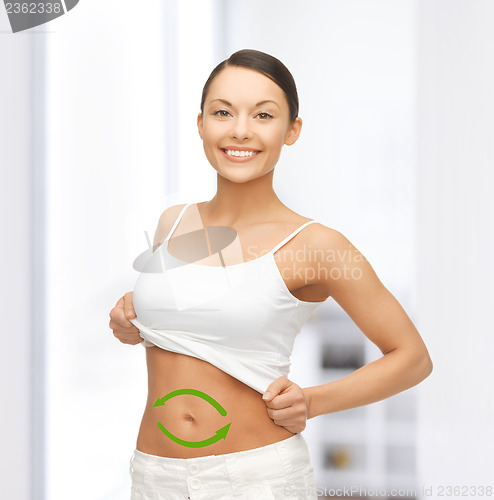 Image of woman with arrows on her stomach