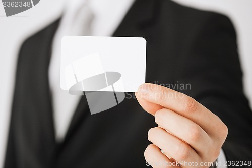 Image of man hand with blank paper