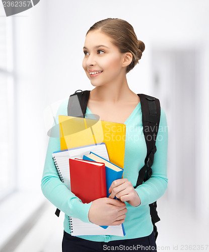 Image of student with books and schoolbag