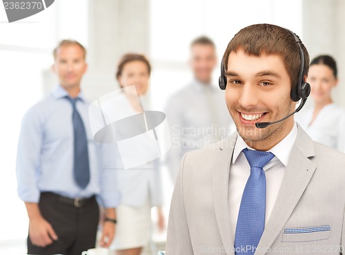 Image of friendly male helpline operator