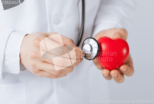 Image of man hands with heart