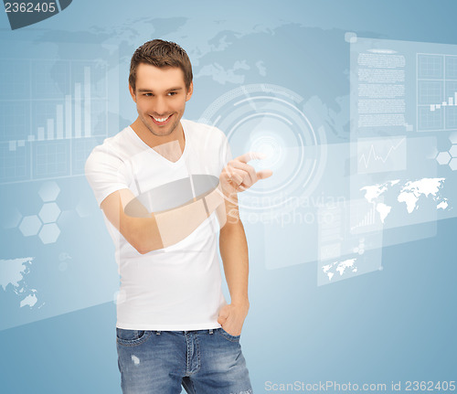 Image of man touching virtual screen