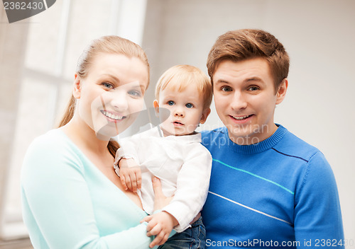 Image of happy family with adorable baby