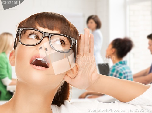 Image of student girl listening gossip at school