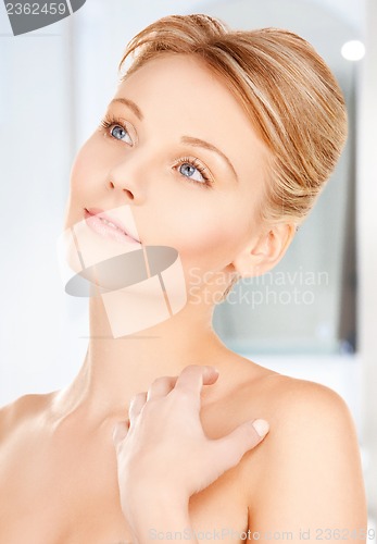 Image of face and hands of beautiful woman