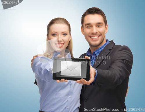 Image of man and woman with tablet pc