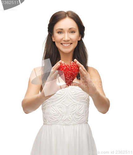 Image of woman showing heart shape