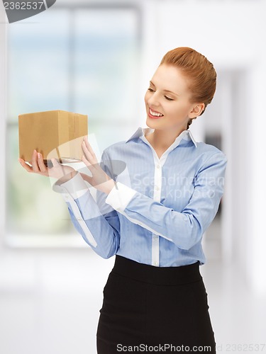 Image of businesswoman with parcel