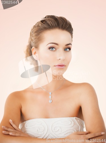 Image of woman with diamond necklace