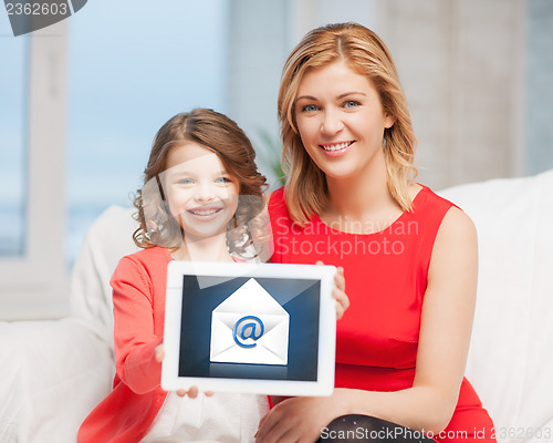 Image of mother and daughter with tablet pc