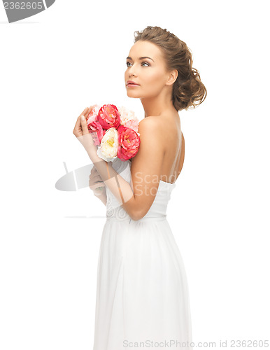 Image of woman with bouquet of flowers