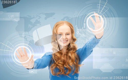 Image of businesswoman working with virtual screens