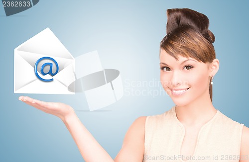 Image of woman showing virtual envelope