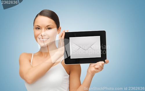 Image of woman with tablet pc and envelope icon