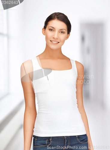 Image of smiling teenage girl in blank white t-shirt