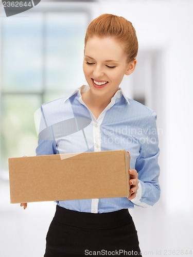 Image of businesswoman with parcel