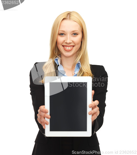 Image of smiling woman with tablet pc in office