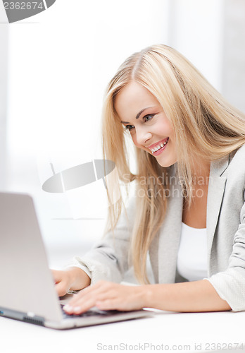 Image of businesswoman with laptop