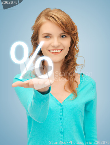 Image of girl showing sign of percent in her hand