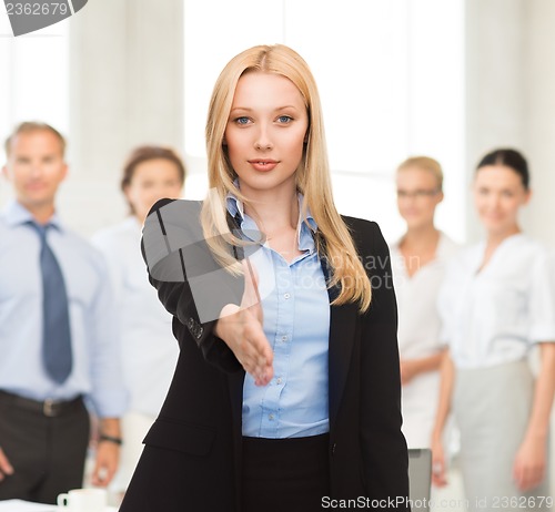 Image of woman with an open hand ready for handshake