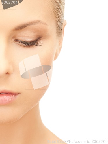 Image of half face of beautiful woman