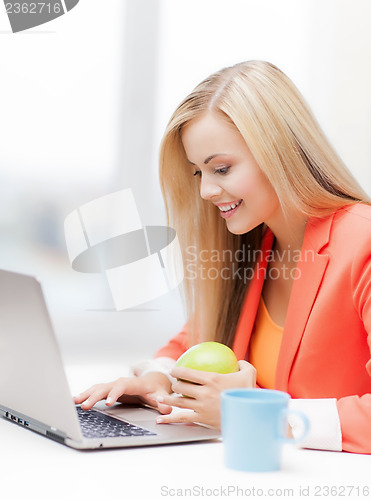 Image of businesswoman with laptop