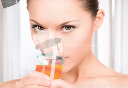 Image of lovely woman with glass of juice